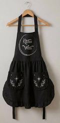 Kitchen Witch Ruffled Apron | Whimsigoth Gothic Kitchen Decor | Cute Black and Silver Cottagecore Pinafore with Pockets, Magic Baker Gift