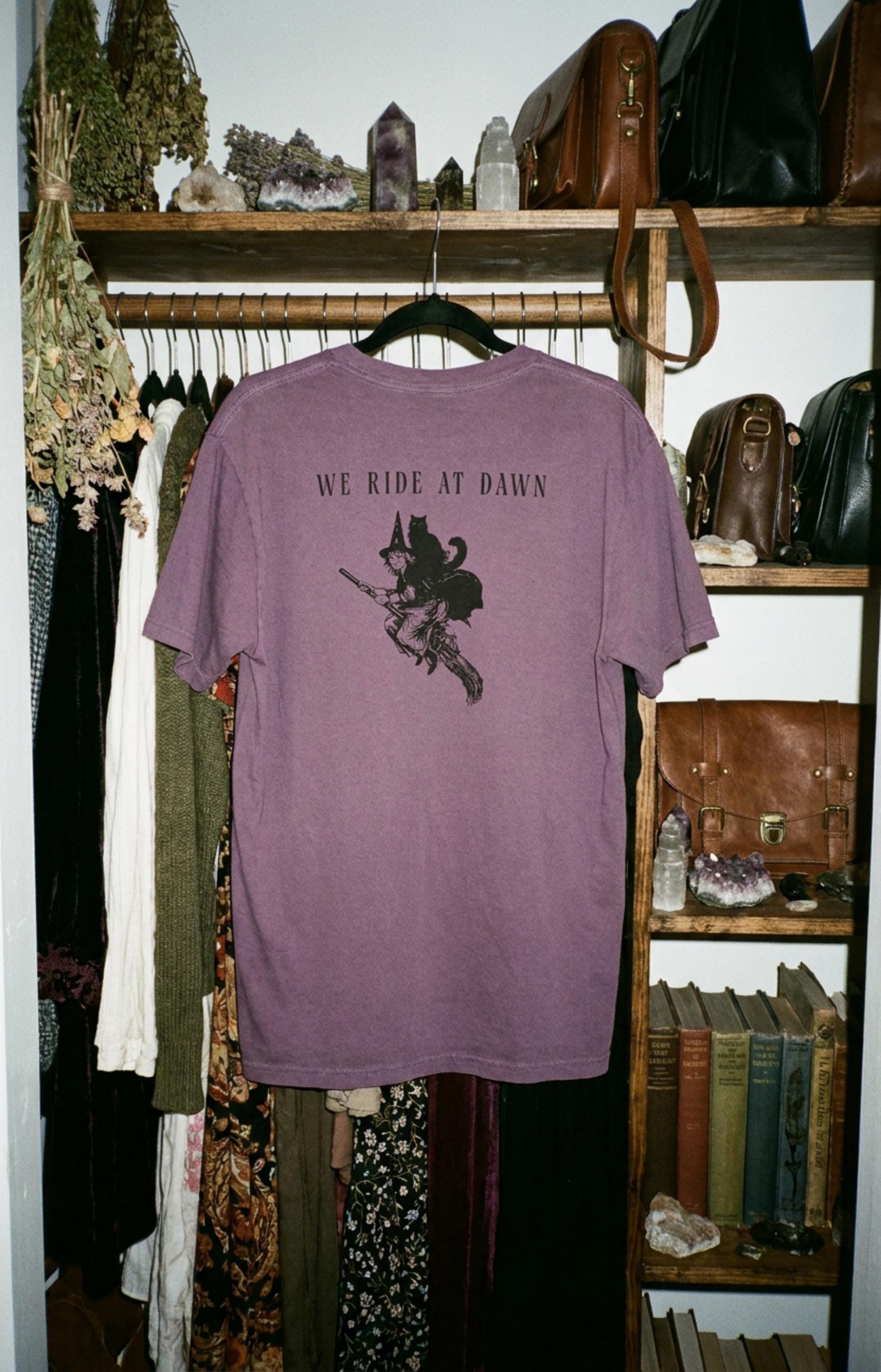 We Ride at Dawn Witch Cat T-shirt – Vintage Style Garment Dyed Tee – Spooky Aesthetic Comfort Colors Shirt – Whimsical Sisterhood Top
