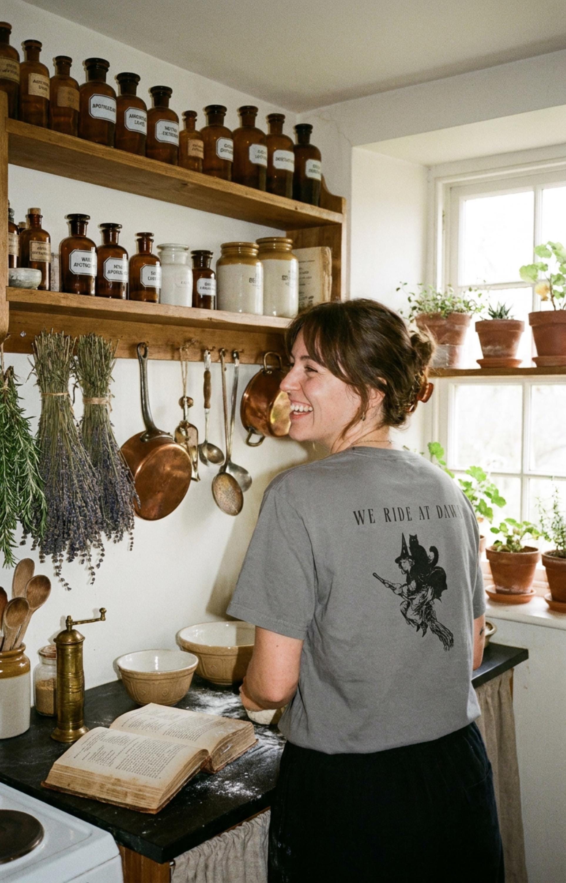 We Ride at Dawn Witch Cat T-shirt – Vintage Style Garment Dyed Tee – Spooky Aesthetic Comfort Colors Shirt – Whimsical Sisterhood Top